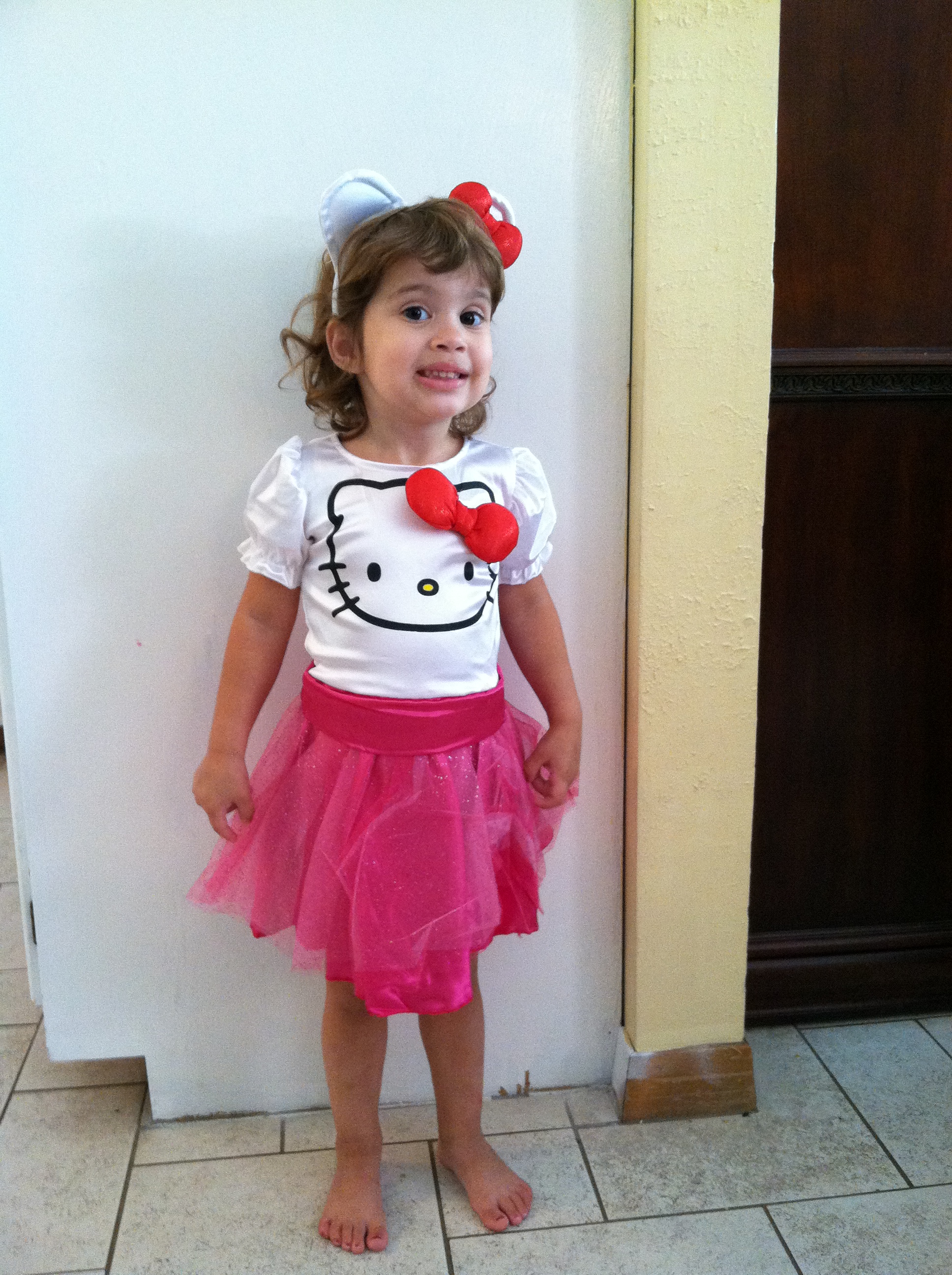 Little girl in Hello Kitty Costume A Day in Motherhood