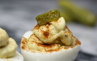 This Spicy Deviled Eggs recipe will have your mouth begging for more! Modify it to make it perfect for you! #RaceDayRelief ad