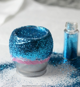 Generously apply glitter to the glitter wine glasses!