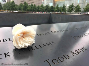 A rose means it is someone's birthday at the Trade Center Memorial