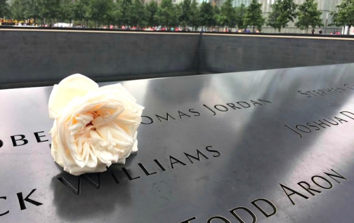 A rose means it is someone's birthday at the Trade Center Memorial
