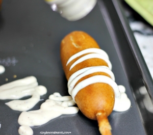Use Ranch to wrap the Mummy Corn Dogs and pair them with Vampire Bitten Corn Dogs