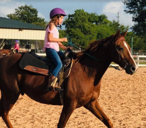 Get Quality Medical Advice 24/7 Online with the Convenient Care Now App - picture of girl on horse on adayinmotherhood.com