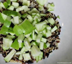 Apples add a sweet crunch to the Slow Cooker Wild Rice Stuffed Cornish Game Hen Recipe