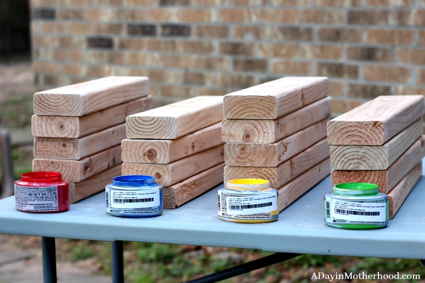 Bright colors make the kids want to play the DIY Outdoor Stacking Game