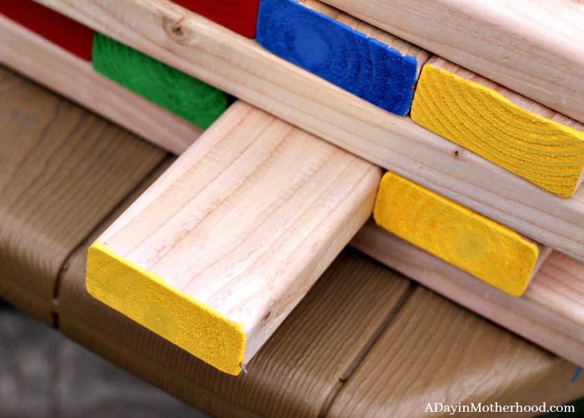 The kids can handle the larger boards of the DIY Outdoor Stacking Game