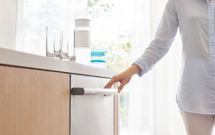 Bosch 800 Series Dishwasher Features - photo of woman opening dishwasher on adayinmotherhood.com